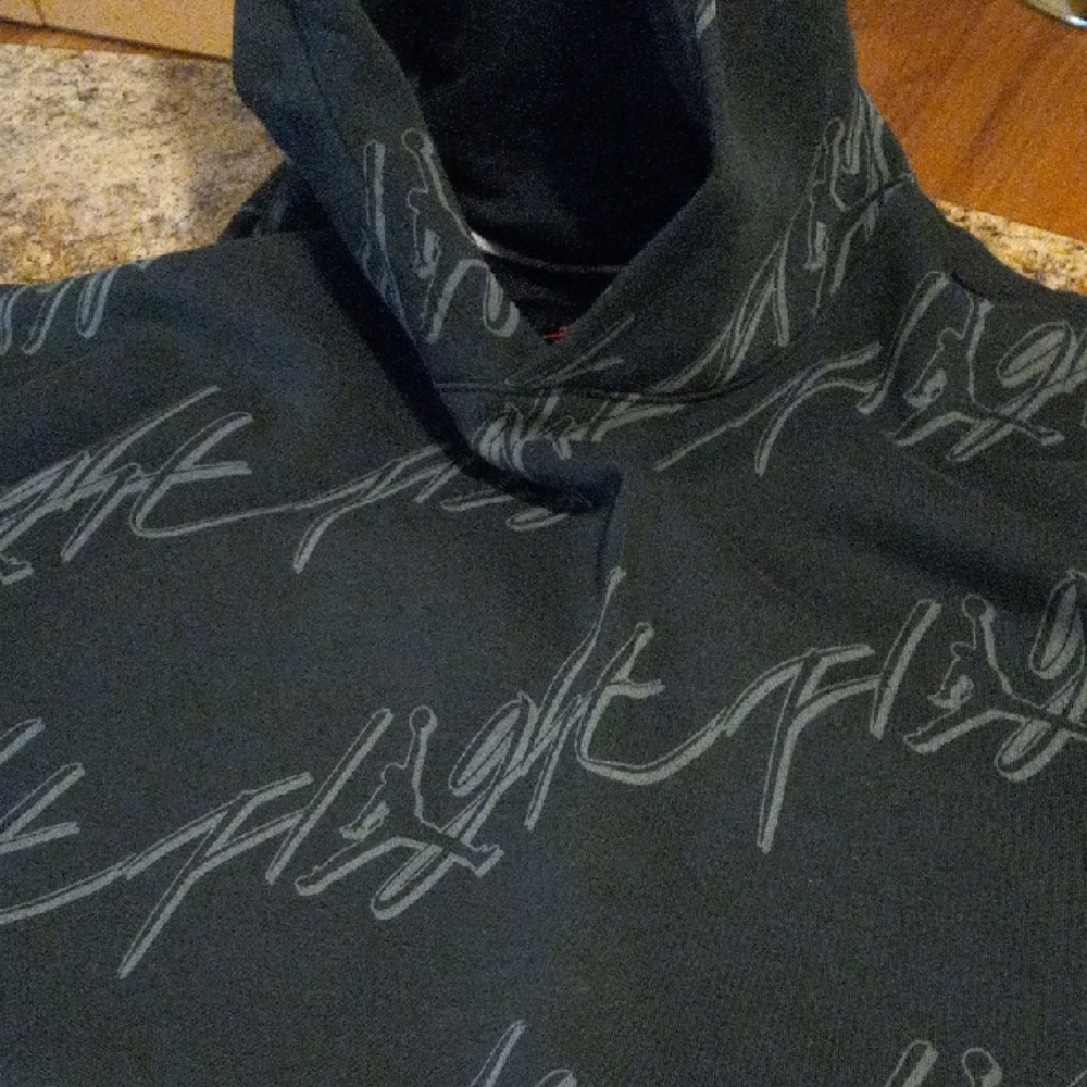 Jordan Black V-Neck Sweater with Subtle Script Pattern - Picture 5 of 5